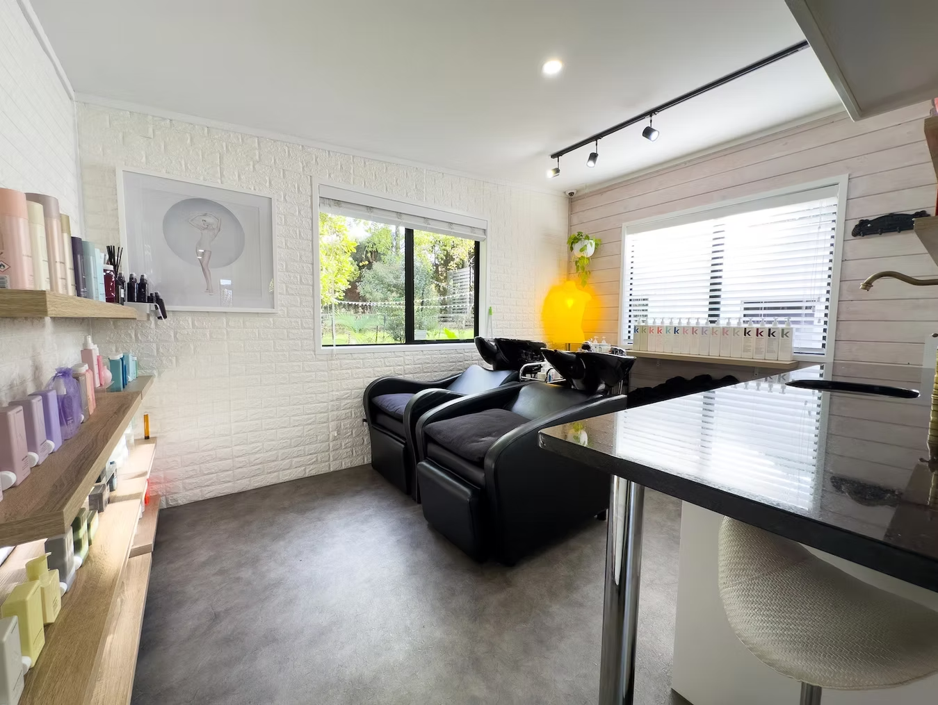 Professional hair wash station at Studio 15 with premium low-tox products